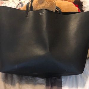 A mid condition black Victoria secret bag